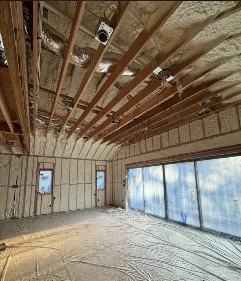 Interior walls and ceiling insulated with spray foam during new construction in Kalifornsky